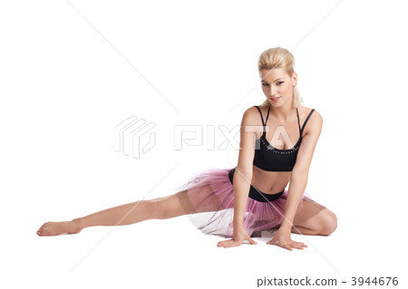 Athletic young woman posing in dance sport costume 3944676