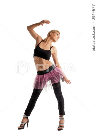 Athletic young woman posing in dance sport costume Athletic young woman posing in dance sport costume 3944677