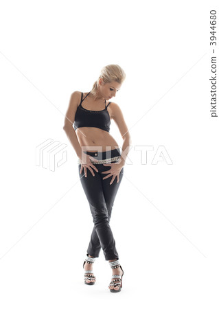 Athletic young woman posing in dance sport costume 3944680