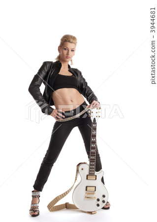 rock woman in black leather posing with guitar rock woman in black leather posing with guitar 3944681