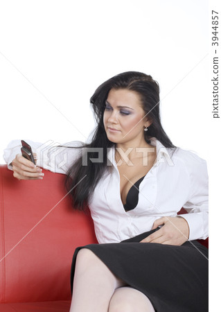 woman with open decollete look at phone woman with open decollete look at phone 3944857