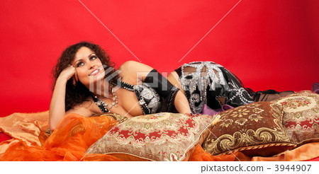 Beauty woman lay on pillow and smile 3944907
