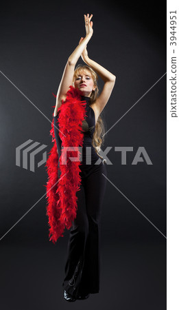 Blond woman dance with red boa 3944951