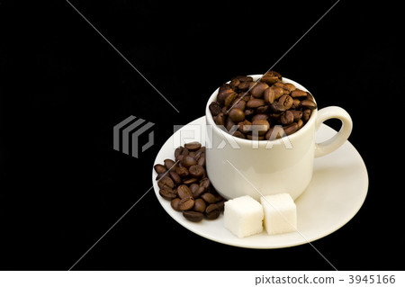 white cup with coffee beans and shugar white cup with coffee beans and shugar 3945166