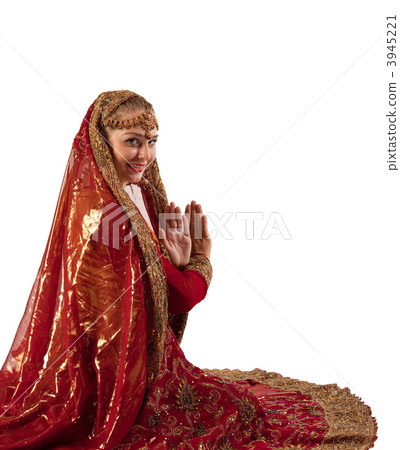 Young girl smile in oriental red indian costume 3945221