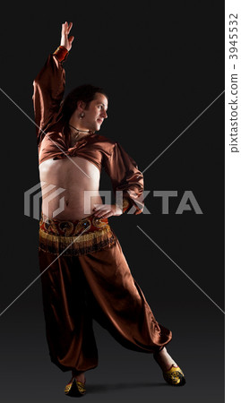 Man dance in brown traditional arabian costume 3945532