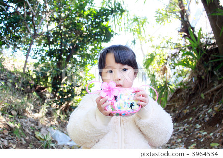 A 3 year old girl showing your favorite bag (winter) A 3 year old girl showing your favorite bag (winter) 3964534
