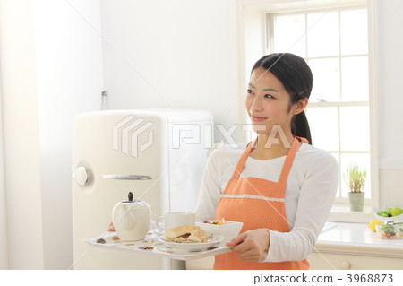 Female kitchen smile 3968873