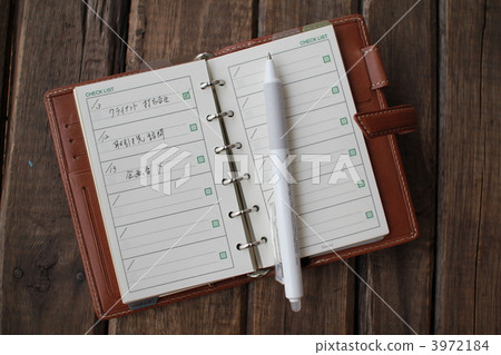 Leather-covered system planner/schedule book Leather-covered system planner/schedule book 3972184