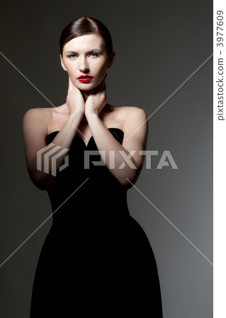 young woman in black dress young woman in black dress 3977609