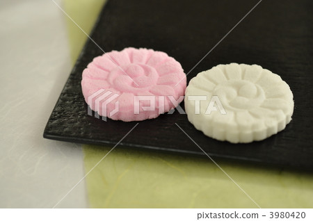 Dry sweets on black lacquerware Dry sweets on black lacquerware 3980420