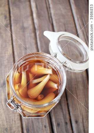 A jar of homemade, pesticide-free pickled shallots in sweet vinegar 3986853