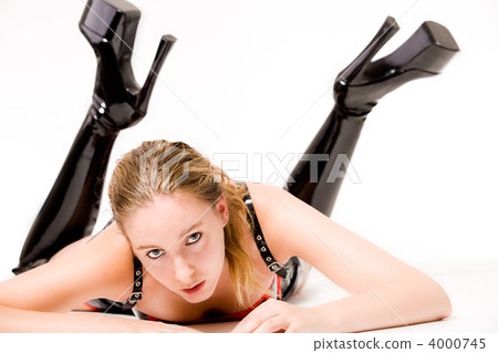 beautifull blond in laque clothing and high heeled boots 4000745