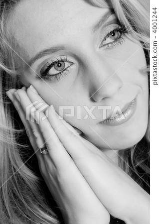 Studio portrait of a long blond girl in rest Studio portrait of a long blond girl in rest 4001244