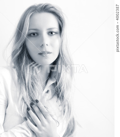Young woman on white background portrait Young woman on white background portrait 4002387