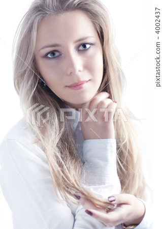 Young woman on white background portrait 4002437