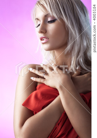 Young blond woman with red cloth 4003184