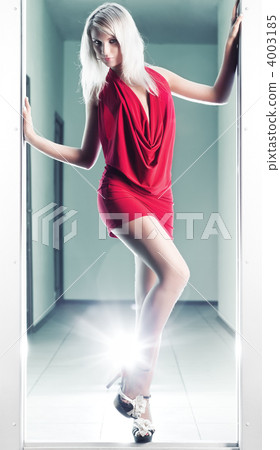 Sexy slim woman in red dress Sexy slim woman in red dress 4003185
