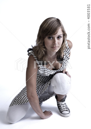 Teenager on one knee Teenager on one knee 4003581