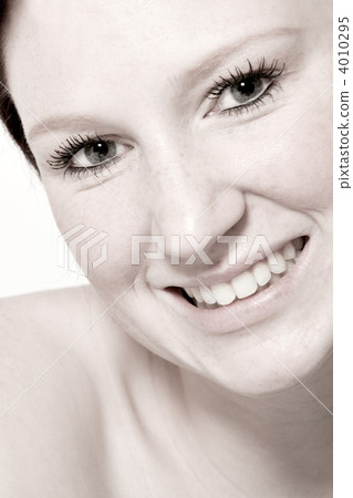 Studio portrait of a young woman with short hair flirting Studio portrait of a young woman with short hair flirting 4010295