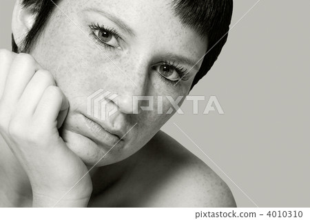 Studio portrait of a bored young woman with short hair 4010310