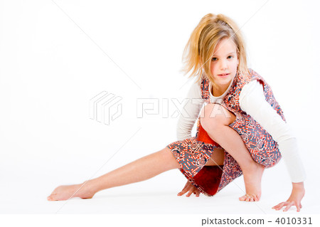 Blond child stretching her leg Blond child stretching her leg 4010331