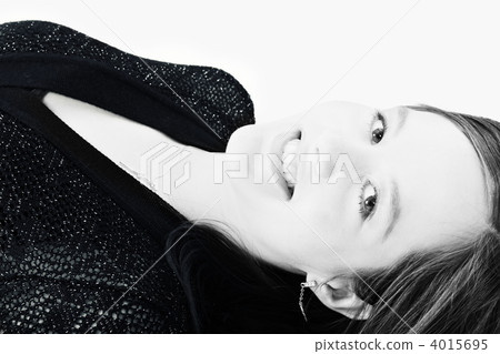 Beautiful model lying on the studio floor Beautiful model lying on the studio floor 4015695
