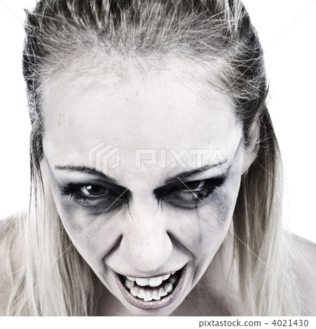 Studio portrait of a scary young blond woman Studio portrait of a scary young blond woman 4021430
