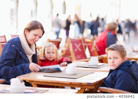 Family at outdoor cafe Family at outdoor cafe 4036641