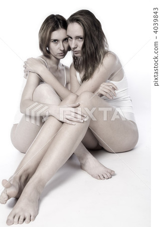 2 girls holding 2 girls holding 4039843