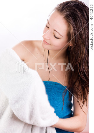 Wellness woman is holding a towel Wellness woman is holding a towel 4041233