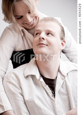 Portrait of a young loving couple looking 4043429