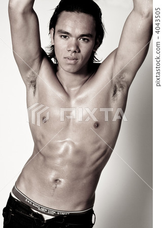 Asian sexy looking boy showing his muscles Asian sexy looking boy showing his muscles 4043505