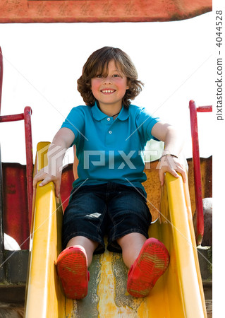Young boy on the playground Young boy on the playground 4044528
