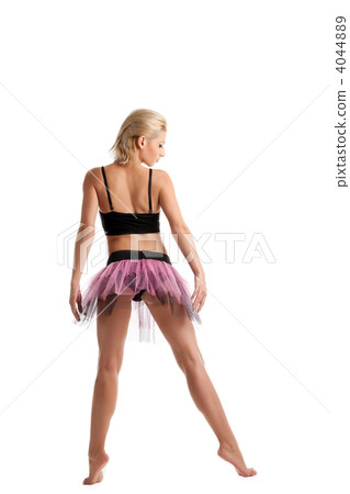 Athletic young woman posing in dance sport costume 4044889
