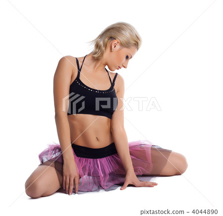 Athletic young woman posing in dance sport costume Athletic young woman posing in dance sport costume 4044890