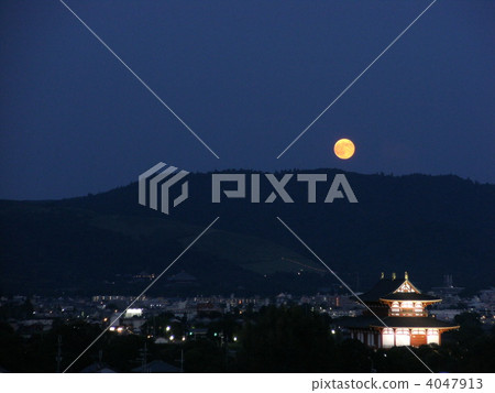 The full moon rising in the Nara Kasugayama primitive forest 4047913
