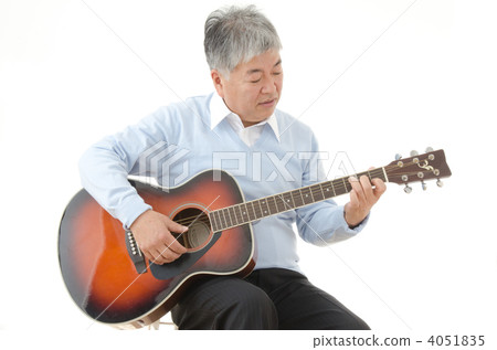 Senior men playing acoustic guitar 4051835