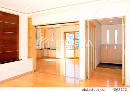 A living room and a dining room of a newly built house A living room and a dining room of a newly built house 4062122