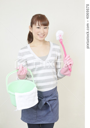 Young housewife with toilet sweeping goods 4069878