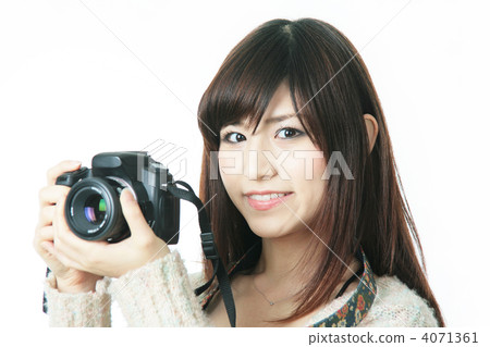 A young lady with a camera 4071361