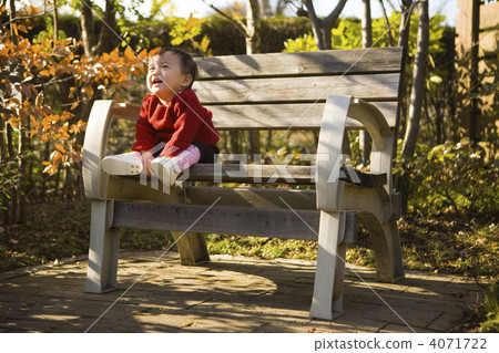 Baby sitting on the bench 2 Baby sitting on the bench 2 4071722