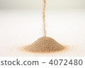 Sand from hand (vertical) 4072480