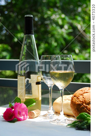 White wine with glasses outside 4073310