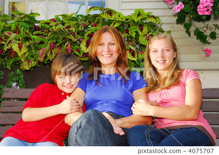 Family at a house Family at a house 4075707