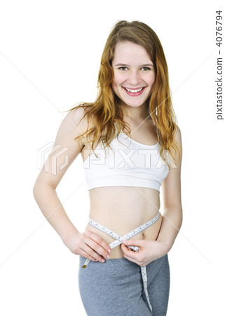 Healthy girl measuring her waist 4076794