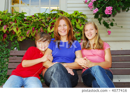 Family at a house Family at a house 4077416