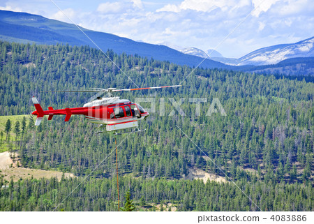 Rescue helicopter in mountains 4083886