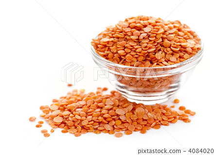 Bowl of uncooked red lentils Bowl of uncooked red lentils 4084020