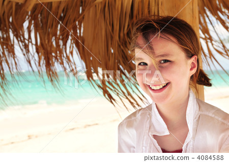 Young girl on tropical beach 4084588